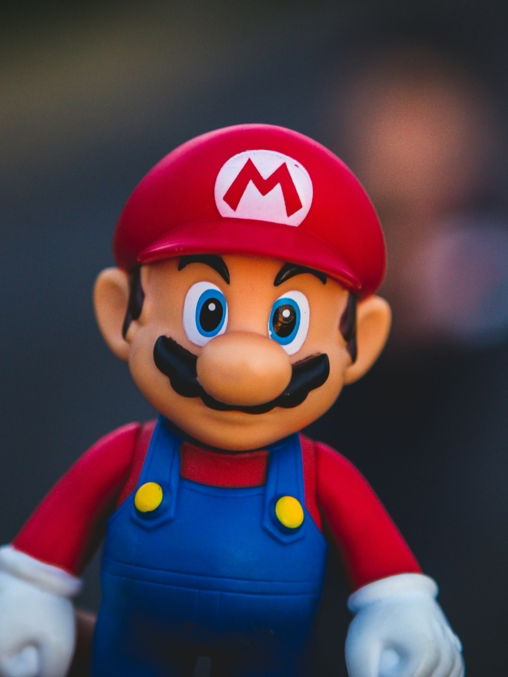 super mario in blue and red shirt figurine